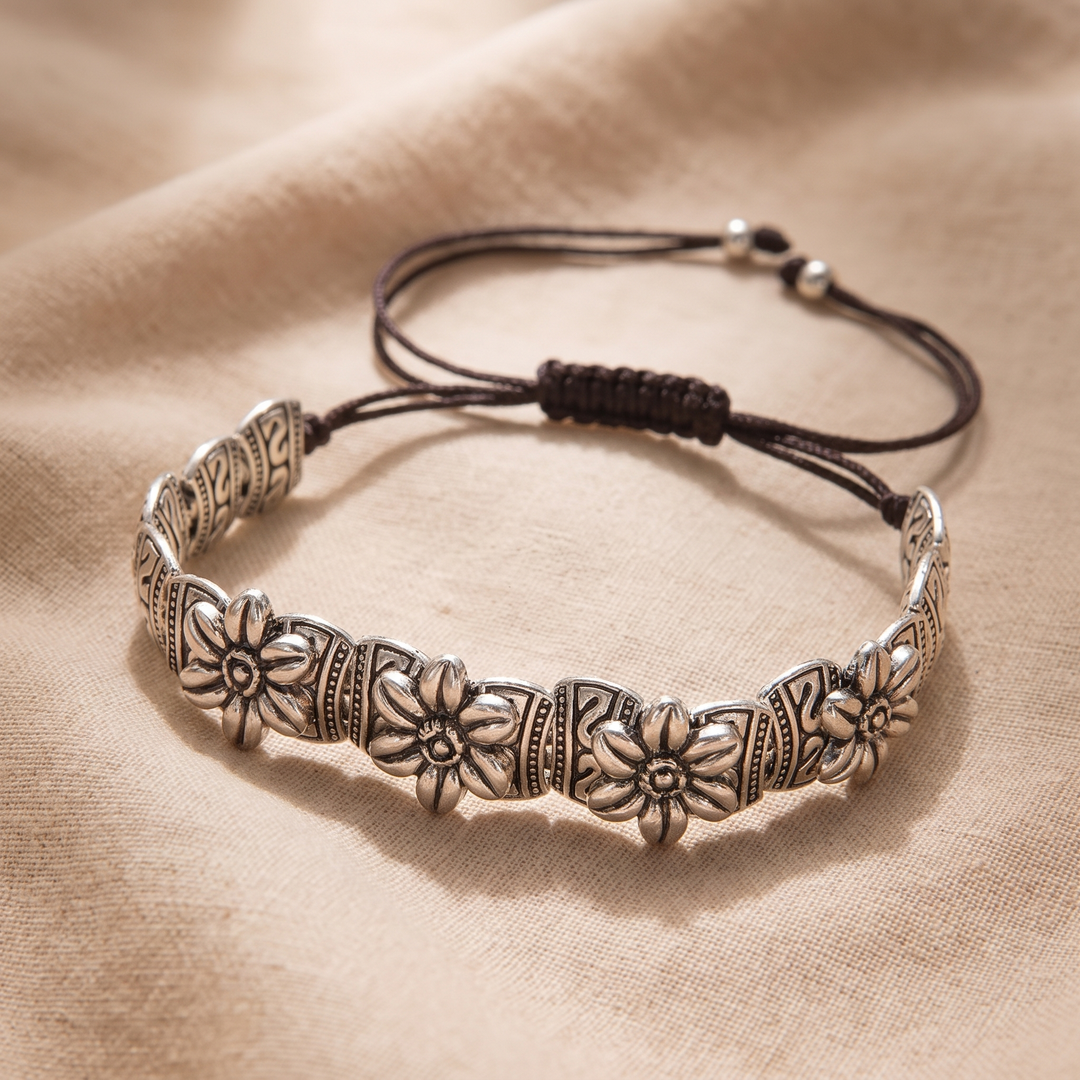 LAVINIA | CARVED DAISY BEAD CORD BRACELET